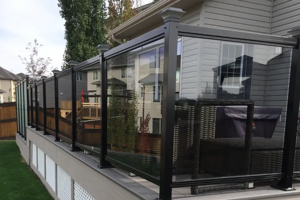 Clear Glass Blocking Wind Around a Deck